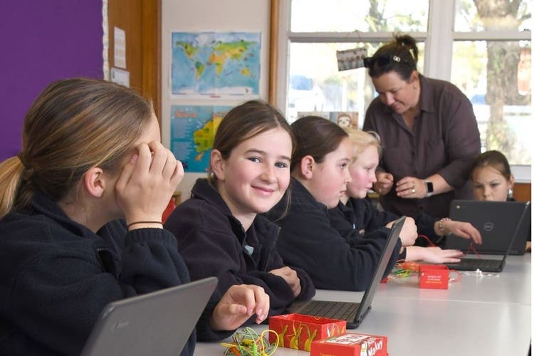 Students and a teacher doing STEM activities